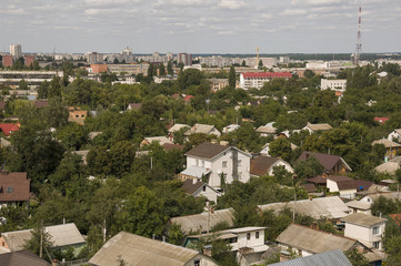 Fototapeta na wymiar Chernigov, Ukraine. August 15, 2017. Small buildings and streets. View from the top high