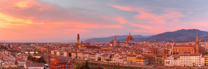 Panorama of Duomo Santa Maria Del Fiore, tower of Palazzo Vecchio and famous bridge Ponte Vecchio at gorgeous sunset from Piazzale Michelangelo in Florence, Tuscany, Italy