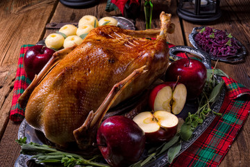 Roast Christmas duck with apples