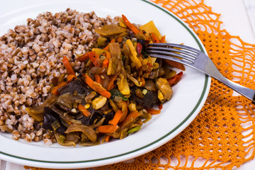 Boiled buckwheat with stewed vegetables