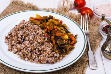 Boiled buckwheat with stewed vegetables