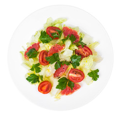 Vegetarian salad from cabbage, tomatoes and grapefruit