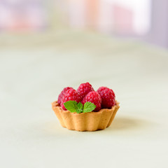 Mini tart with raspberries fruits