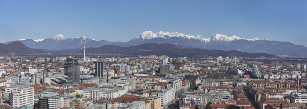 Panoramic view of Ljubljana with snovy Kamnik-Savinja Alps in background, Slovenia
