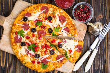 Delicious homemade pizza with salami