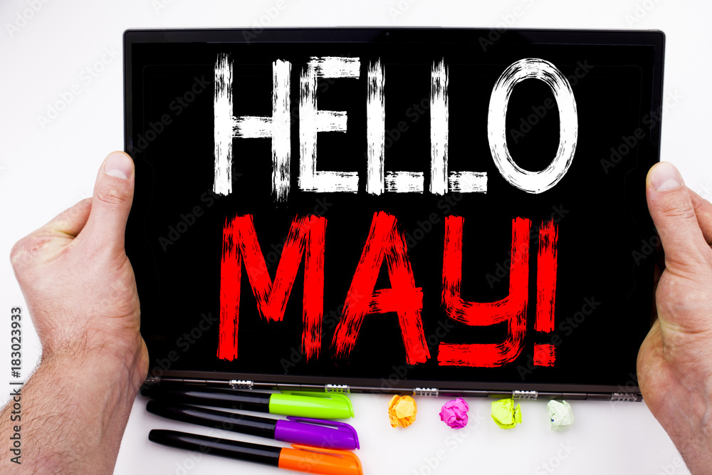 Fototapete hello may. spring text written on tablet, computer in the office with marker, pen, stationery. busin