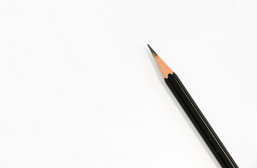 Sharp pencil black color put on blank white paper 