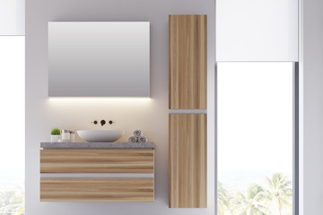 White and wooden bathroom sink