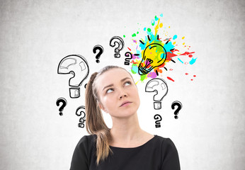 Pensive woman with a ponytail, question answer