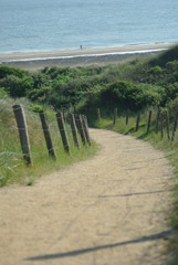 Sandstrand im Sonnenaufgang und Sonnenuntergang