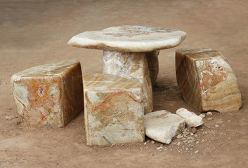 chairs and tables made of marble.