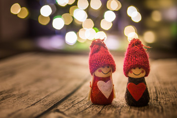 Abstract background of love and dreams with two wooden toys