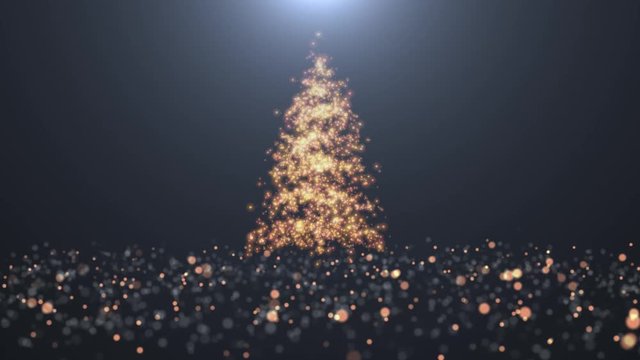 Weihnachtsbaum aus goldenen Lichtpartikeln vor dunklem Hintergrund