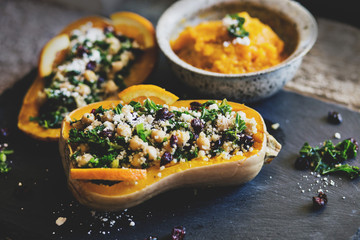 Stuffed Butternut Squash with kale, cranberries, quinoa, and chickpeas