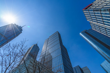 Fototapeta na wymiar Modern office buildings on a clear sky background