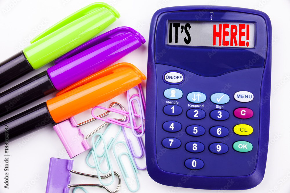 Fototapete Writing word It's Here text in the office with surroundings such as marker, pen writing on calculator. Business concept for advertisement white background with copy space