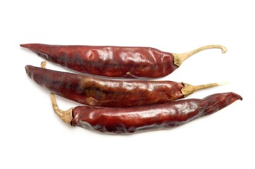 dry red chili pepper on white background