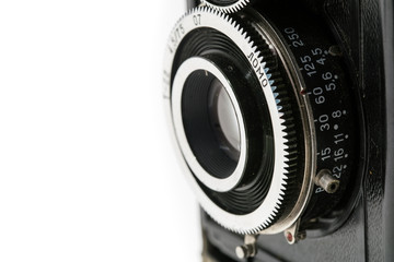 Very Old Vintage Lens, Close Up Macro Studio Shot on White Background with space for Text