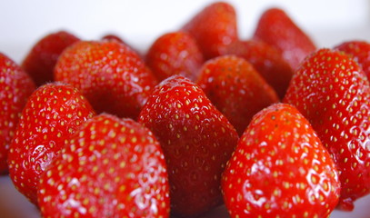 ripe strawberry on a plate