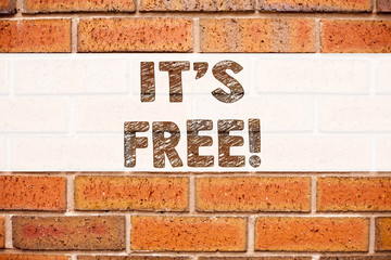 Fototapeta na wymiar Conceptual announcement text caption inspiration showing It's Here. Business concept for Free Things written on old brick background with copy space