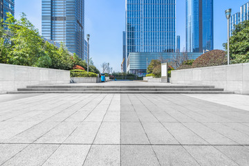 Fototapeta premium modern glass building exterior with empty pavement