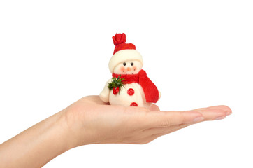 snowman Cristmas decoration in hand isolated on white background. New Year object