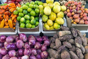 Naklejka na ściany i meble Different vegetables and fruits for sale at a market in Santiago, Chile