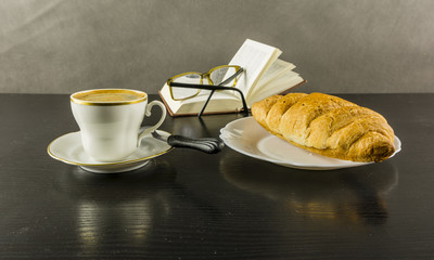 Croissant and coffee during a reading break.