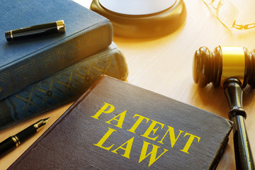 Book about Patent Law and gavel. Copyright concept.