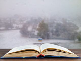 open book at the window