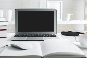 Hipster office workspace with empty laptop screen