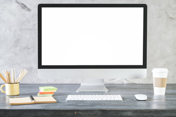 Fototapeta premium Creative desktop with clean white computer screen