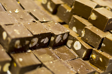 Brown milky chocolate bars with hazelnuts