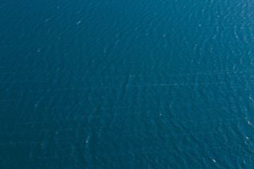 Water surface with brightness in the distance
