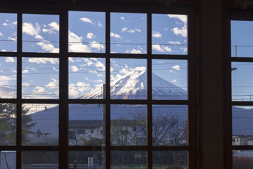 view of fuji mountain with snow cap in window frame, yamanshi, japan, winter season,