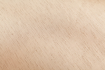 Closeup of textured brown textile with selective focus