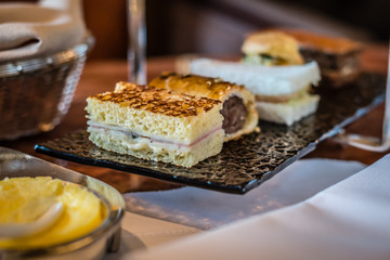 three tier afternoon tea set and pastries