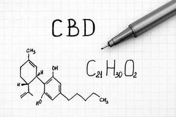 Chemical formula of Cannabidiol (CBD) with black pen