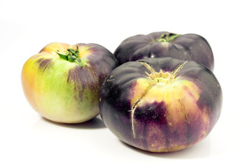 group of tomatoes isolated on white