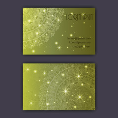 Vector vintage visiting card set. Glowing shiny floral mandala pattern and ornaments. Luxury design.