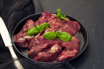 raw chicken liver with black pepper