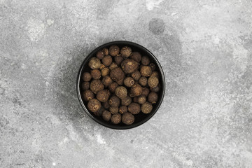 Pepper on a gray background. Top view. Food background