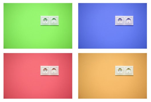 The dual power socket on the wall different colors in four variants