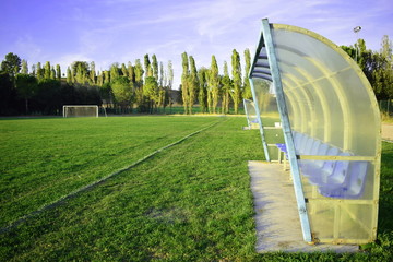 View of a football field in a beautiful sunny day.