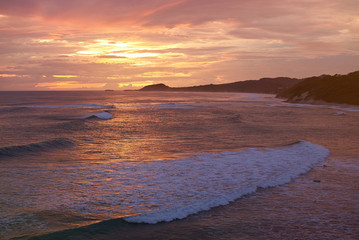 Colorful sunset on ocean coastline