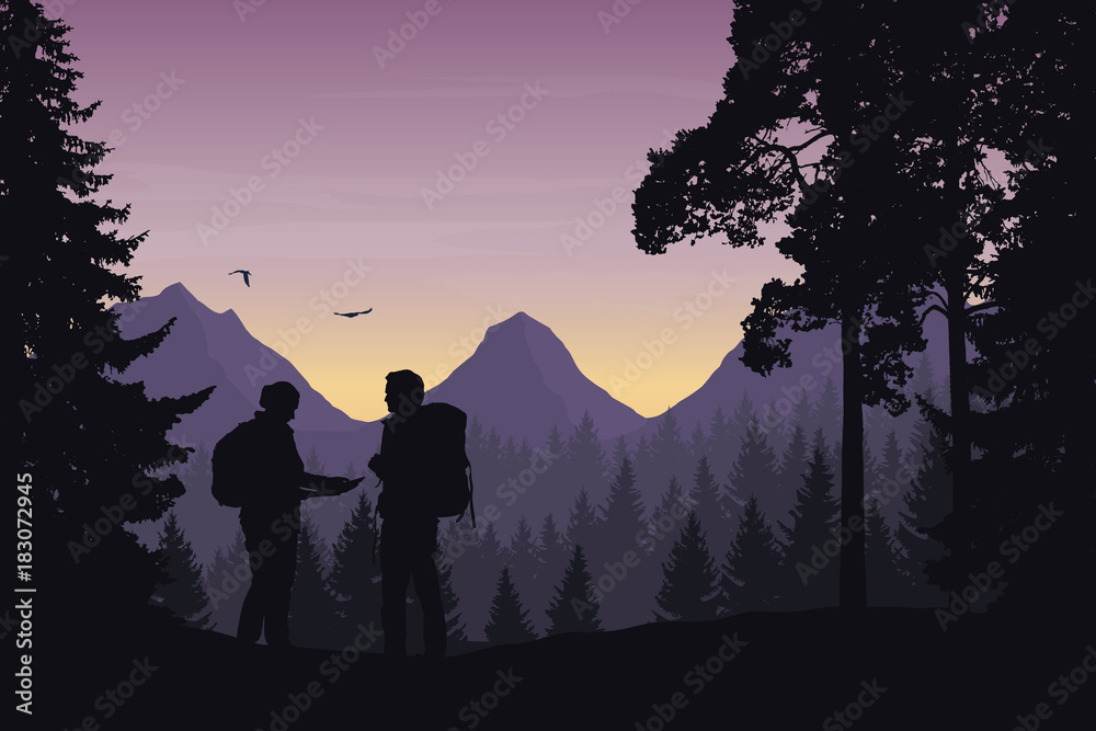 Wall mural two tourists walking through a mountain landscape with a forest looking for a path in the map under 