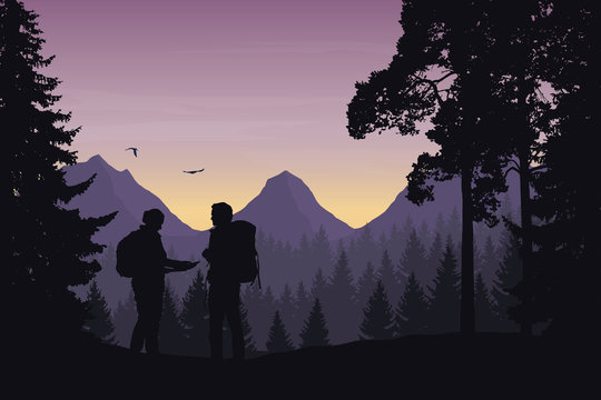 Two tourists walking through a mountain landscape with a forest looking for a path in the map under a morning sky with dawn