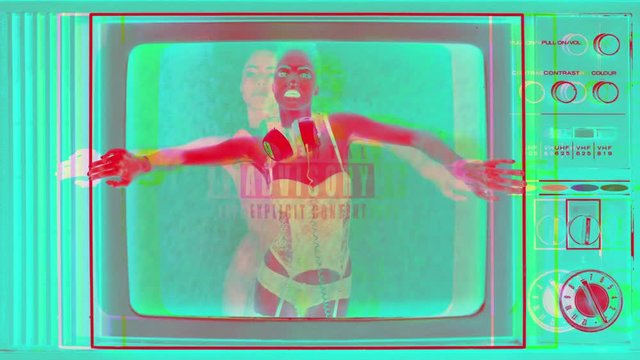 beautiful sexy woman in red lingerie dancing stuck inside retro television