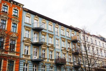 Row of colorful tenement buildings