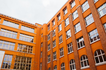 Bright orange conversion of an industrial building